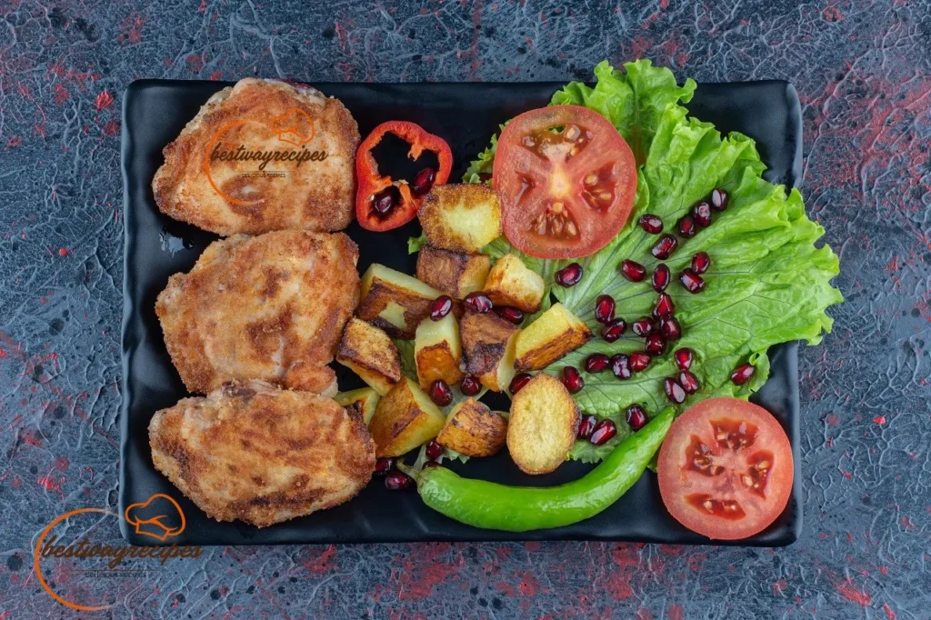 plate vegetables chicken cutlets