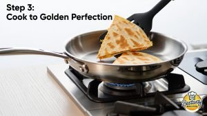 Tuna Melt Quesadilla Step 3 - Heat and Butter the Pan Initial cooking step showing proper pan preparation and quesadilla placement